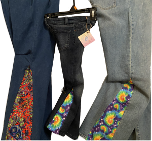 Three Groovy Britches jeans of different sizes